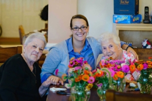 Caregiver with two clients